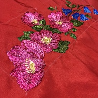 Цветы  - вышивка логотипа на крое