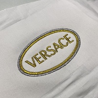 Versache - вышивка логотипа на крое